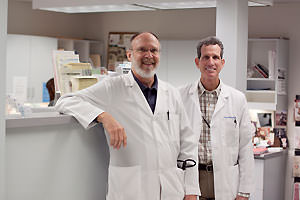 Physicians standing by counter